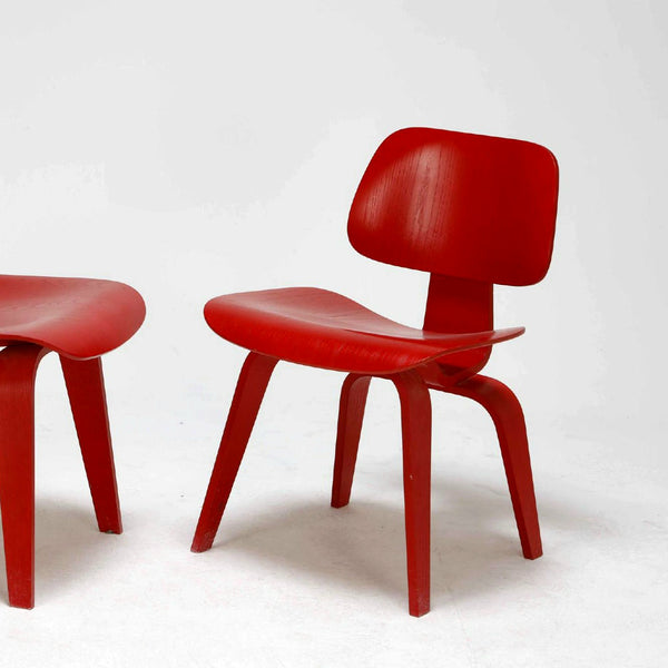 Ray & Charles Eames pair of DCW chairs for Vitra 1990s